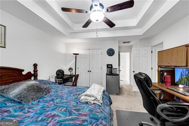 12 Mulberry Rd, Winder, GA 30680 - bedroom with a raised ceiling, light carpet, an office area, a closet, and ceiling fan