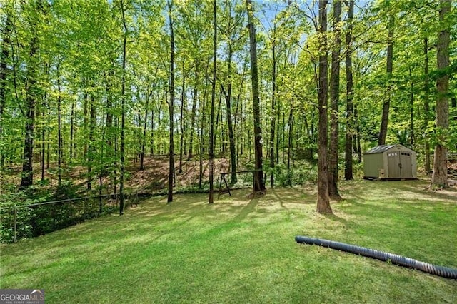 12 Mulberry Rd, Winder, GA 30680 - view of yard with a storage unit