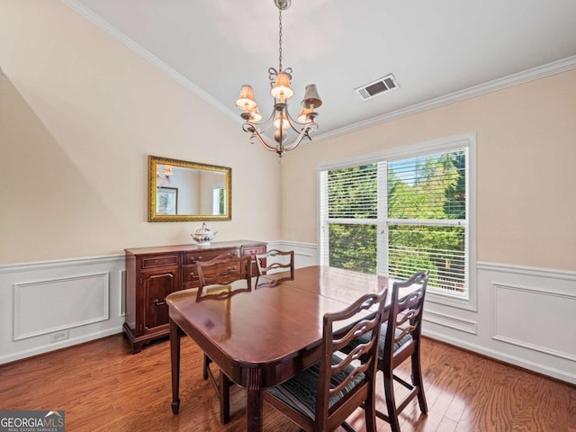 2402 Jasmine Glen Dr, Buford, GA 30519 - dining area with an inviting chandelier, a wainscoted wall, and visible vents