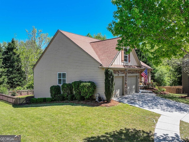 2402 Jasmine Glen Dr, Buford, GA 30519 - view of home's exterior featuring concrete driveway, a shingled roof, and board and batten siding