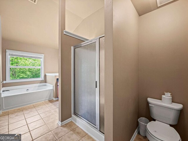 2402 Jasmine Glen Dr, Buford, GA 30519 - full bathroom with lofted ceiling, a shower stall, tile patterned flooring, and a garden tub