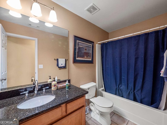 2402 Jasmine Glen Dr, Buford, GA 30519 - bathroom featuring vanity, tile patterned floors, and shower / tub combo