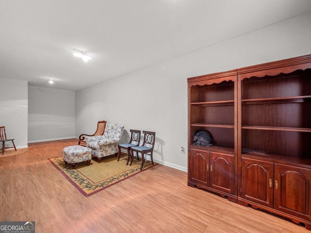 2402 Jasmine Glen Dr, Buford, GA 30519 - sitting room featuring light wood-style flooring and baseboards