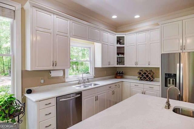 835 Timothy Rd, Athens, GA 30606 - kitchen featuring ornamental molding, appliances with stainless steel finishes, a sink, and light countertops