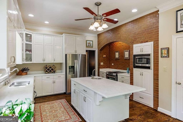835 Timothy Rd, Athens, GA 30606 - kitchen with white cabinets, stainless steel appliances, a sink, ceiling fan, and light countertops