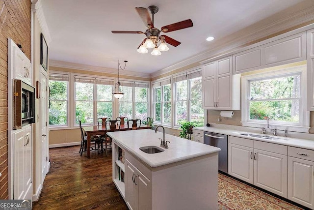 835 Timothy Rd, Athens, GA 30606 - kitchen with light countertops, a sink, appliances with stainless steel finishes, and crown molding