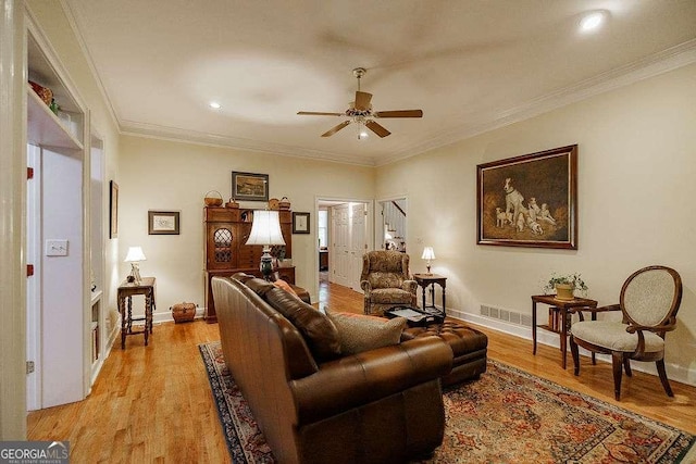 835 Timothy Rd, Athens, GA 30606 - living area featuring a ceiling fan, stairs, light wood finished floors, baseboards, and visible vents