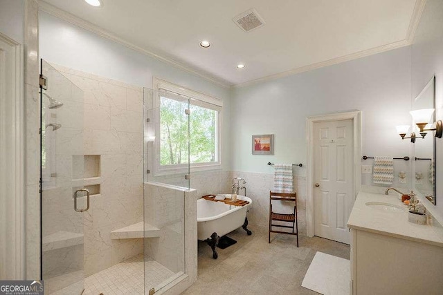 835 Timothy Rd, Athens, GA 30606 - bathroom with a stall shower, tile walls, visible vents, a freestanding tub, and ornamental molding