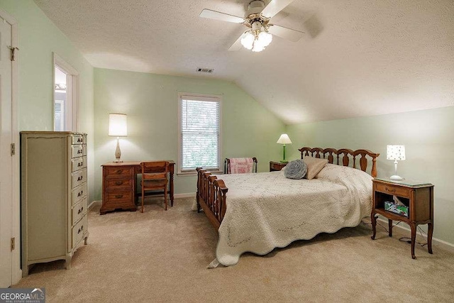 835 Timothy Rd, Athens, GA 30606 - bedroom featuring vaulted ceiling, light carpet, a textured ceiling, and visible vents