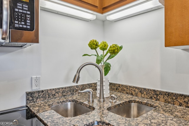 5300 Peachtree Rd Unit 3601, Atlanta, GA 30341 - kitchen view of dark stone counters and a sink
