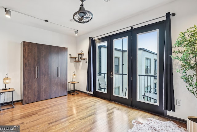 5300 Peachtree Rd Unit 3601, Atlanta, GA 30341 - foyer entrance with french doors and light wood-style floors