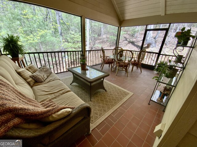 522 Satsuma Ct S, Ellijay, GA 30540 - sunroom with outdoor lounge area and vaulted ceiling