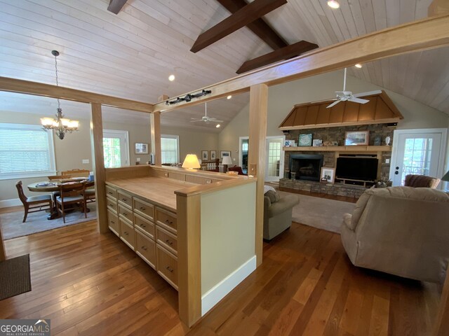 522 Satsuma Ct S, Ellijay, GA 30540 - kitchen featuring ceiling fan, a stone fireplace, hardwood / wood-style floors, wooden ceiling, and recessed lighting