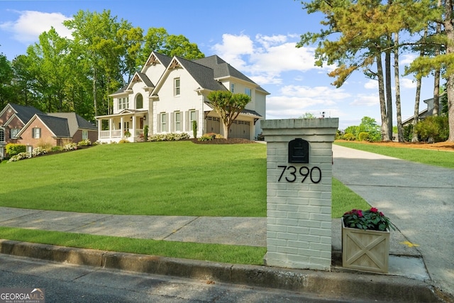 french country inspired facade featuring a front lawn