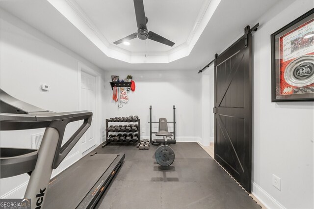 7390 Canter Run, Cumming, GA 30040 - workout area featuring a barn door, ceiling fan, ornamental molding, a tray ceiling, and recessed lighting