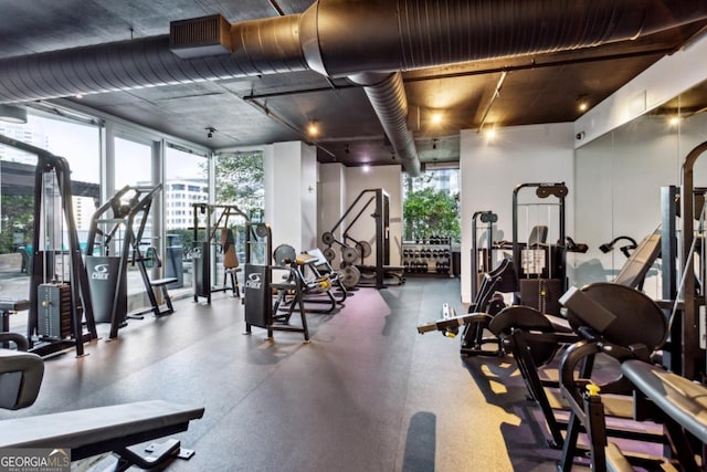 exercise room with expansive windows and visible vents
