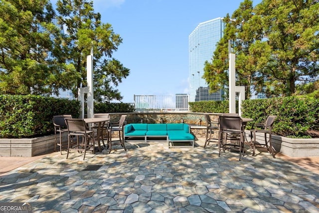 view of patio / terrace with outdoor dining area and outdoor lounge area