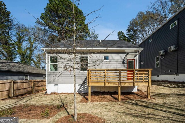102 Dahlia Ave SW, Atlanta, GA 30314 - back of property with a deck, crawl space, and fence