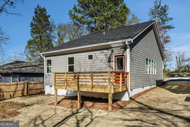 102 Dahlia Ave SW, Atlanta, GA 30314 - rear view of house with fence, a wooden deck, and crawl space
