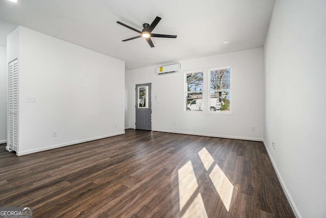 102 Dahlia Ave SW, Atlanta, GA 30314 - unfurnished living room featuring recessed lighting, a wall mounted air conditioner, a ceiling fan, baseboards, and dark wood-style flooring