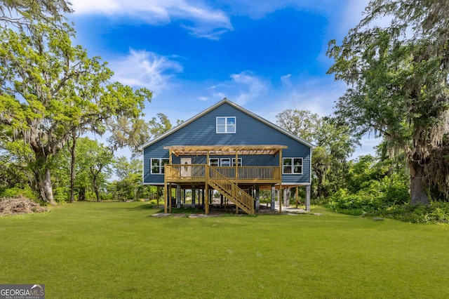 67 Bermuda Bluff Ln, Midway, GA 31320 - back of house featuring a lawn, a wooden deck, stairway, and a pergola
