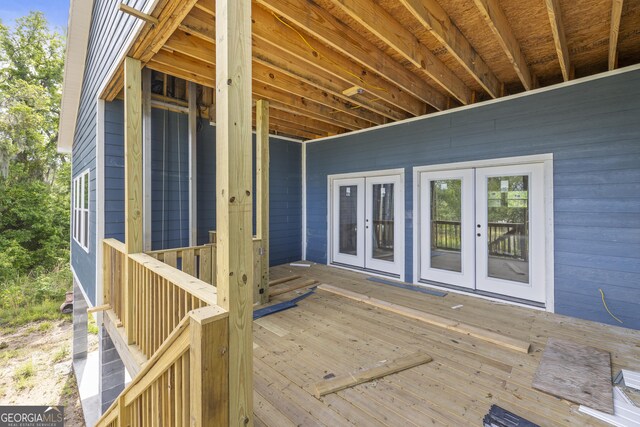 67 Bermuda Bluff Ln, Midway, GA 31320 - wooden deck featuring french doors