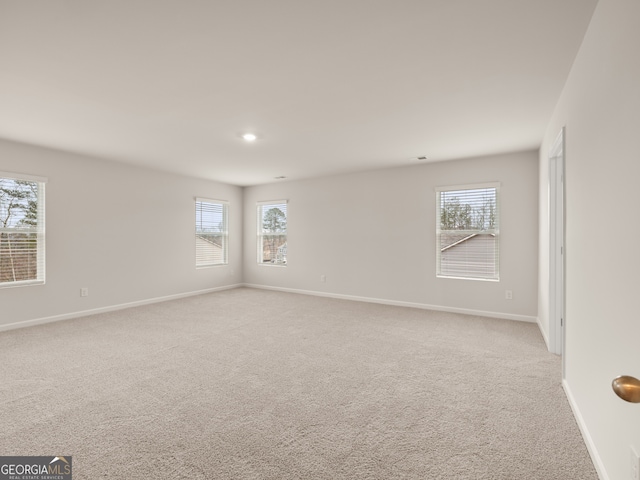 16 Virgil St, Dallas, GA 30132 - spare room featuring baseboards and light colored carpet