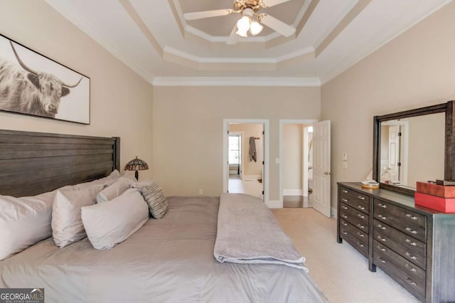 bedroom with a raised ceiling, crown molding, light colored carpet, and ceiling fan