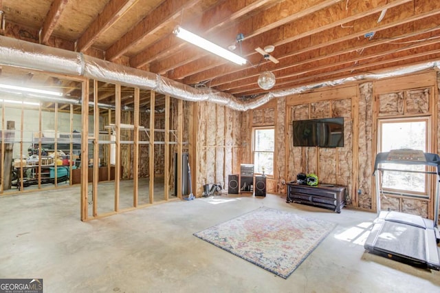 miscellaneous room featuring unfinished concrete floors