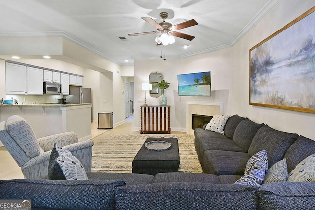161 Limeburn Trl, Saint Simons, GA 31522 - living room featuring ceiling fan, baseboards, crown molding, and recessed lighting