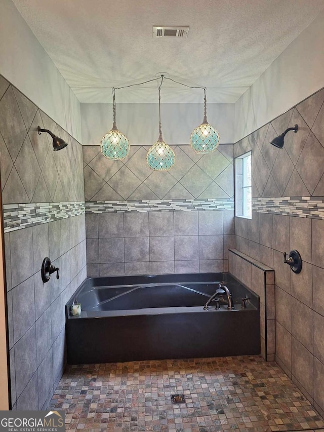 471 Getaway Ln, Baxley, GA 31513 - bathroom featuring a bath and tiled shower