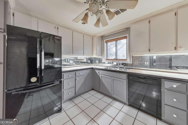 kitchen featuring black appliances, a sink, gray cabinets, light tile patterned floors, and ceiling fan