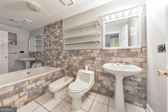 full bathroom with a bidet, tile patterned flooring, toilet, and a sink