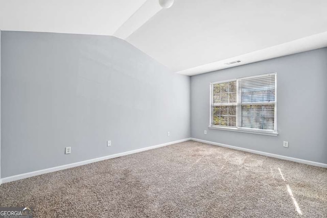 2872 Cross Creek Ct, Cumming, GA 30040 - empty room with lofted ceiling, baseboards, carpet flooring, and visible vents