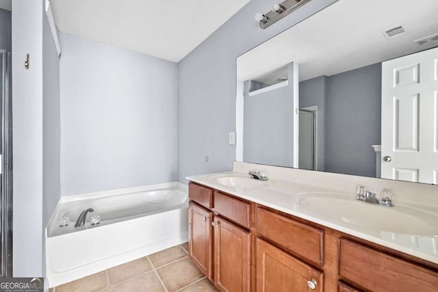 2872 Cross Creek Ct, Cumming, GA 30040 - full bath with a garden tub, tile patterned floors, a sink, and visible vents