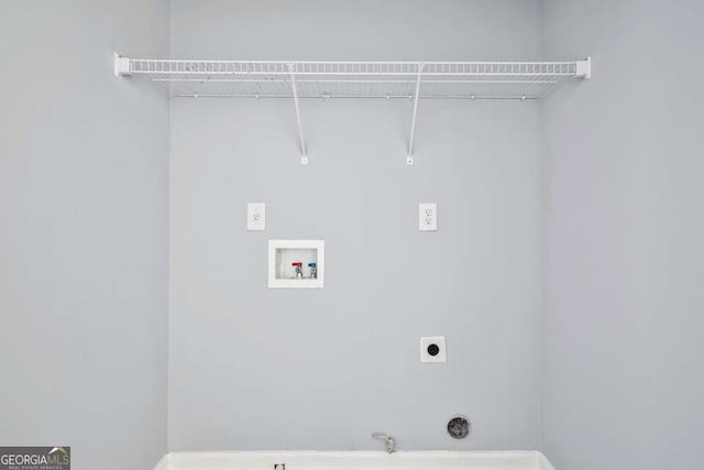 2872 Cross Creek Ct, Cumming, GA 30040 - laundry room featuring electric dryer hookup, baseboards, gas dryer hookup, laundry area, and washer hookup
