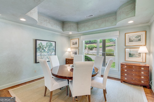 2436 Hawthorne Ln, Gainesville, GA 30506 - dining space featuring wood finished floors, ornamental molding, visible vents, recessed lighting, and baseboards