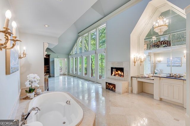 2436 Hawthorne Ln, Gainesville, GA 30506 - full bathroom featuring a warm lit fireplace, a bath, tile patterned flooring, vanity, and high vaulted ceiling