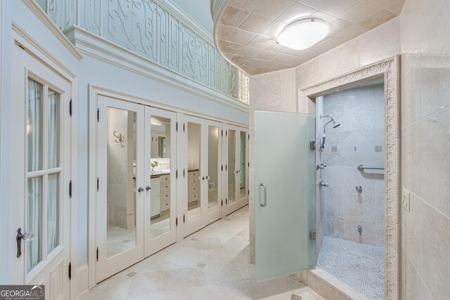 2436 Hawthorne Ln, Gainesville, GA 30506 - full bathroom with french doors, a shower stall, and vanity