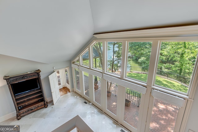 2436 Hawthorne Ln, Gainesville, GA 30506 - interior space with vaulted ceiling, a wealth of natural light, and baseboards