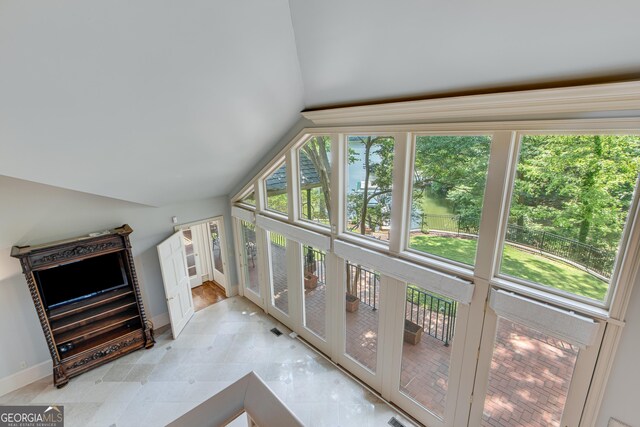 2436 Hawthorne Ln, Gainesville, GA 30506 - additional living space with vaulted ceiling and healthy amount of natural light