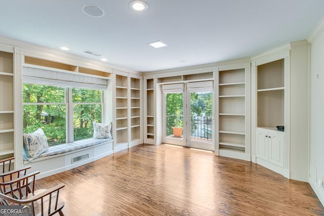 2436 Hawthorne Ln, Gainesville, GA 30506 - unfurnished room with visible vents, built in features, and wood finished floors