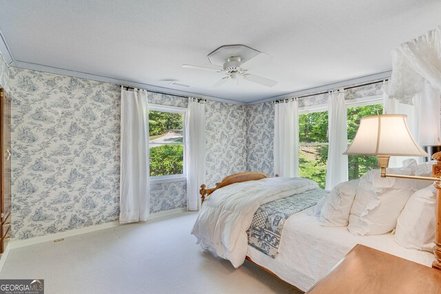 2436 Hawthorne Ln, Gainesville, GA 30506 - carpeted bedroom featuring a ceiling fan and wallpapered walls