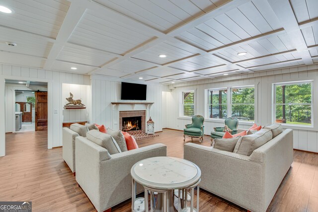 2436 Hawthorne Ln, Gainesville, GA 30506 - living area featuring a wooden ceiling with exposed beams, plenty of natural light, a fireplace, wood finished floors, and recessed lighting