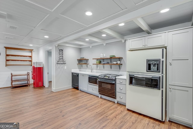 2436 Hawthorne Ln, Gainesville, GA 30506 - kitchen with open shelves, black appliances, recessed lighting, light countertops, and light wood-style floors