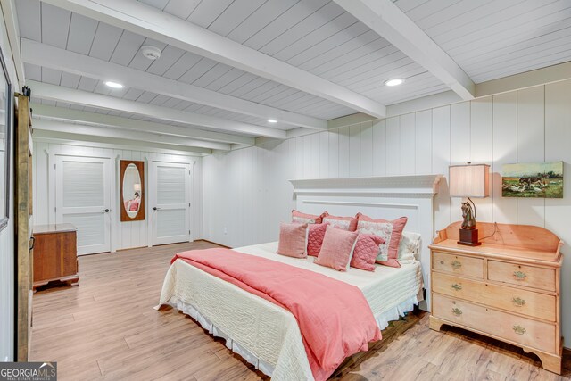 2436 Hawthorne Ln, Gainesville, GA 30506 - bedroom with light wood-style floors, beam ceiling, and recessed lighting