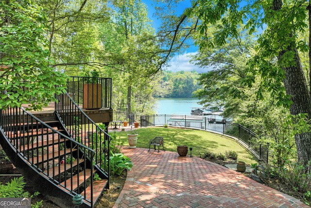 2436 Hawthorne Ln, Gainesville, GA 30506 - view of patio / terrace featuring stairway and a water view