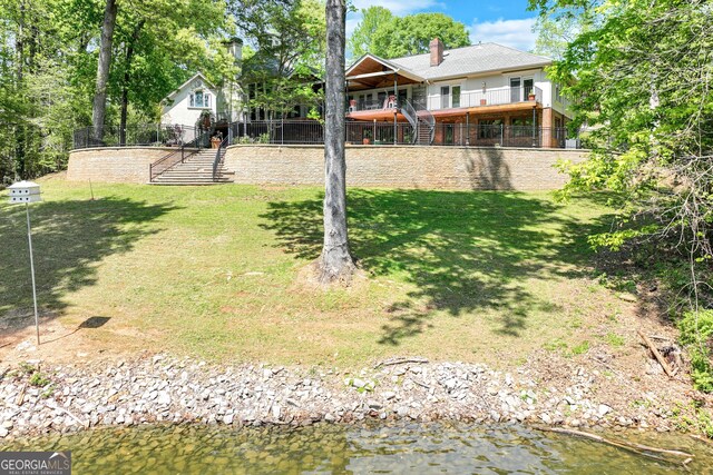 2436 Hawthorne Ln, Gainesville, GA 30506 - view of grassy yard featuring stairs and a water view
