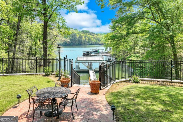 2436 Hawthorne Ln, Gainesville, GA 30506 - view of patio / terrace with a water view, a view of trees, and a boat dock