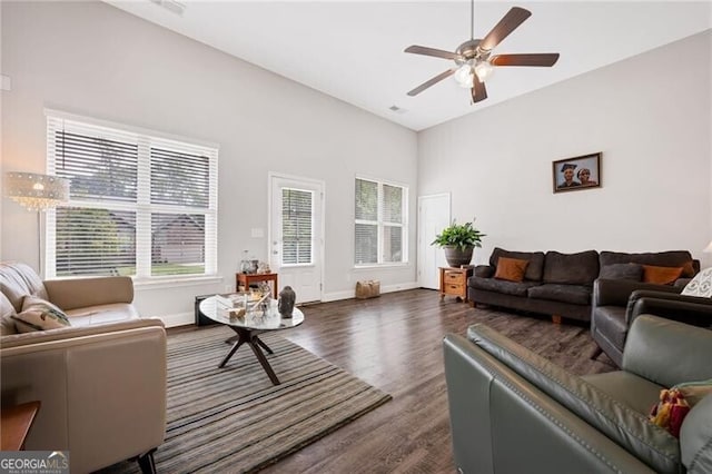 1129 Abundance Dr, Locust Grove, GA 30248 - living area featuring baseboards, a ceiling fan, and dark wood-style floors